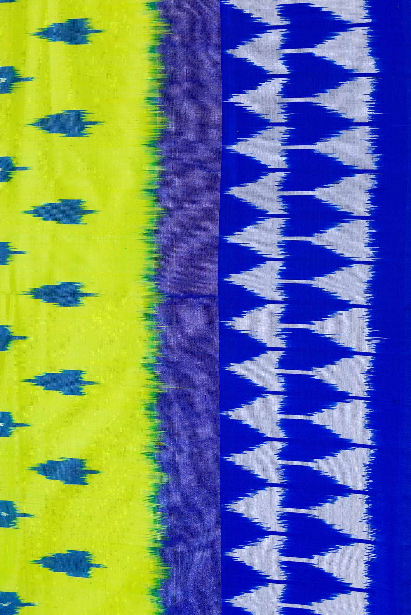 Border image of Parrot Green Dual Tone Double Ikat Saree with Ikat Print on the body and Ikat Border. 