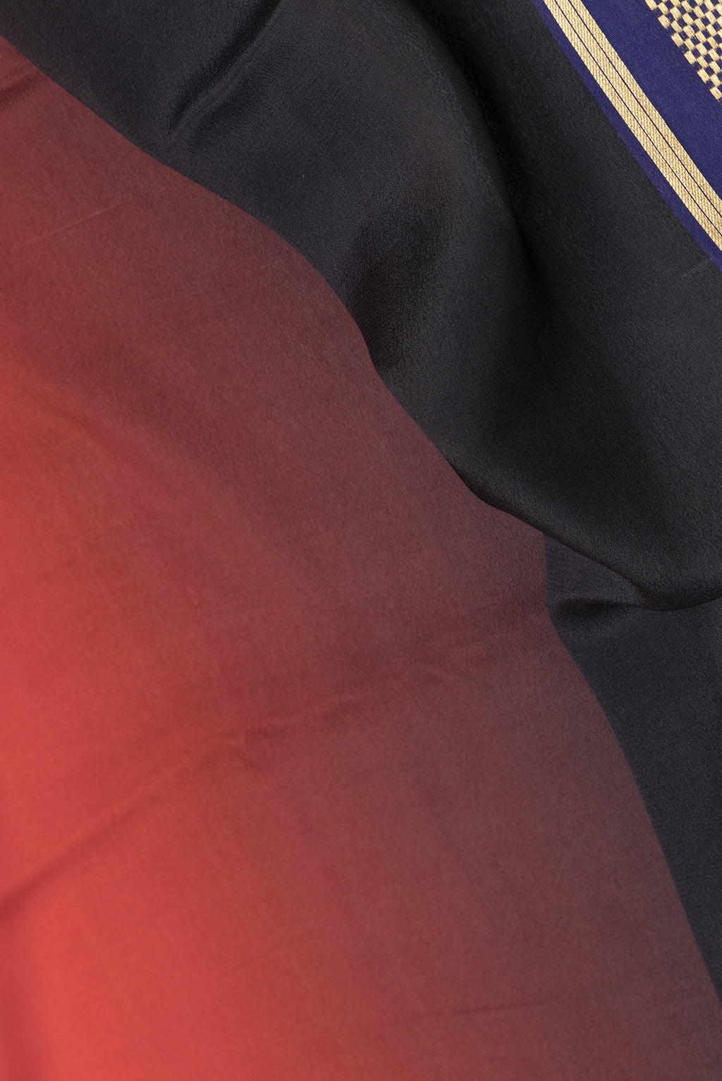 Close up of Multi Color Mysore Silk Saree with Plain Body and Zari Border.  displaying folds