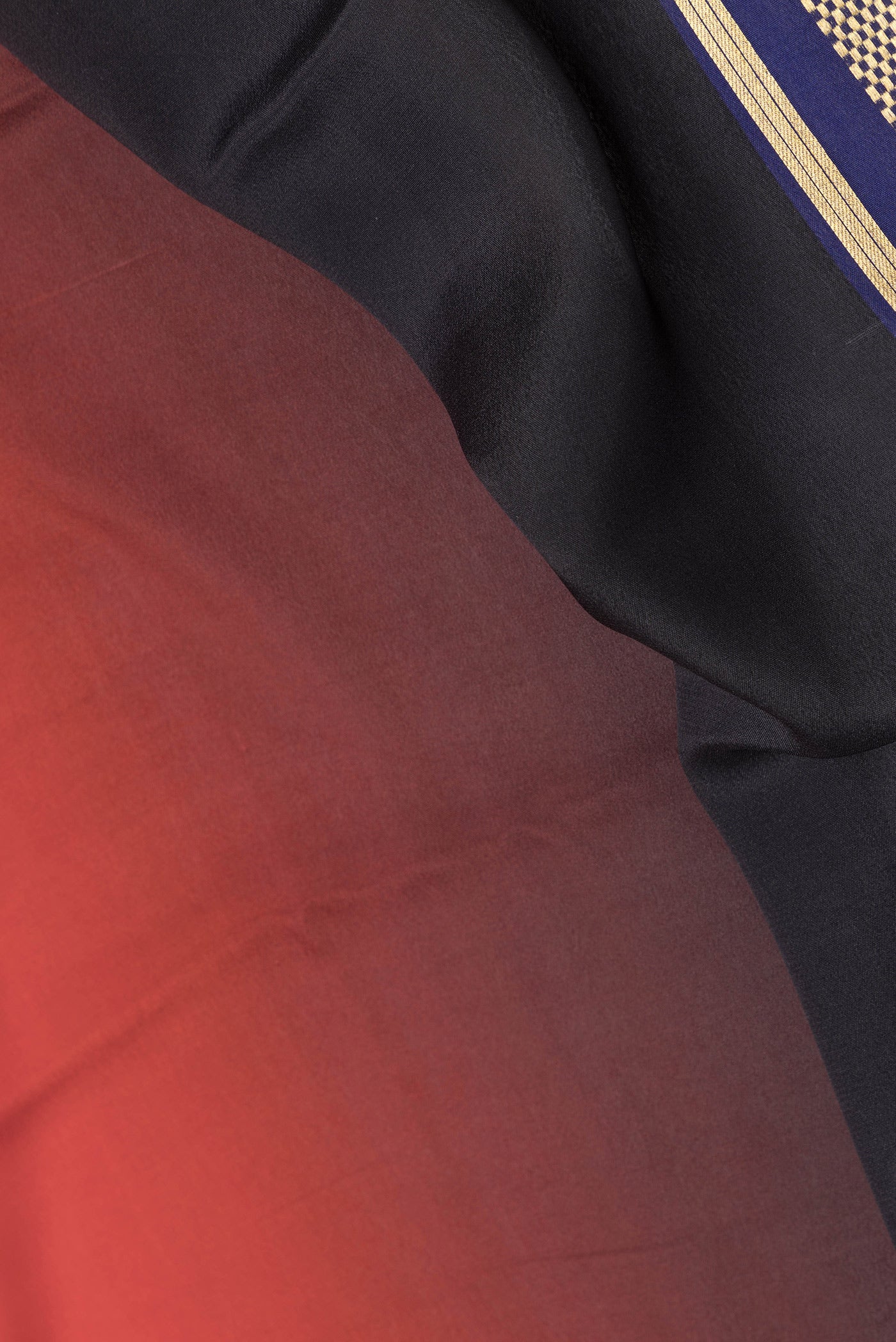 Close up of Multi Color Mysore Silk Saree with Plain Body and Zari Border.  displaying folds