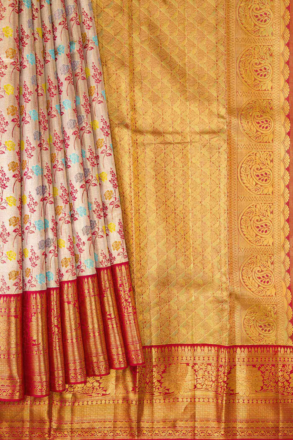 Pleats and pallu of Gold Dual Tone Kanchipuram Tissue Silk Saree with Zari Brocade on the body and Zari Border. 