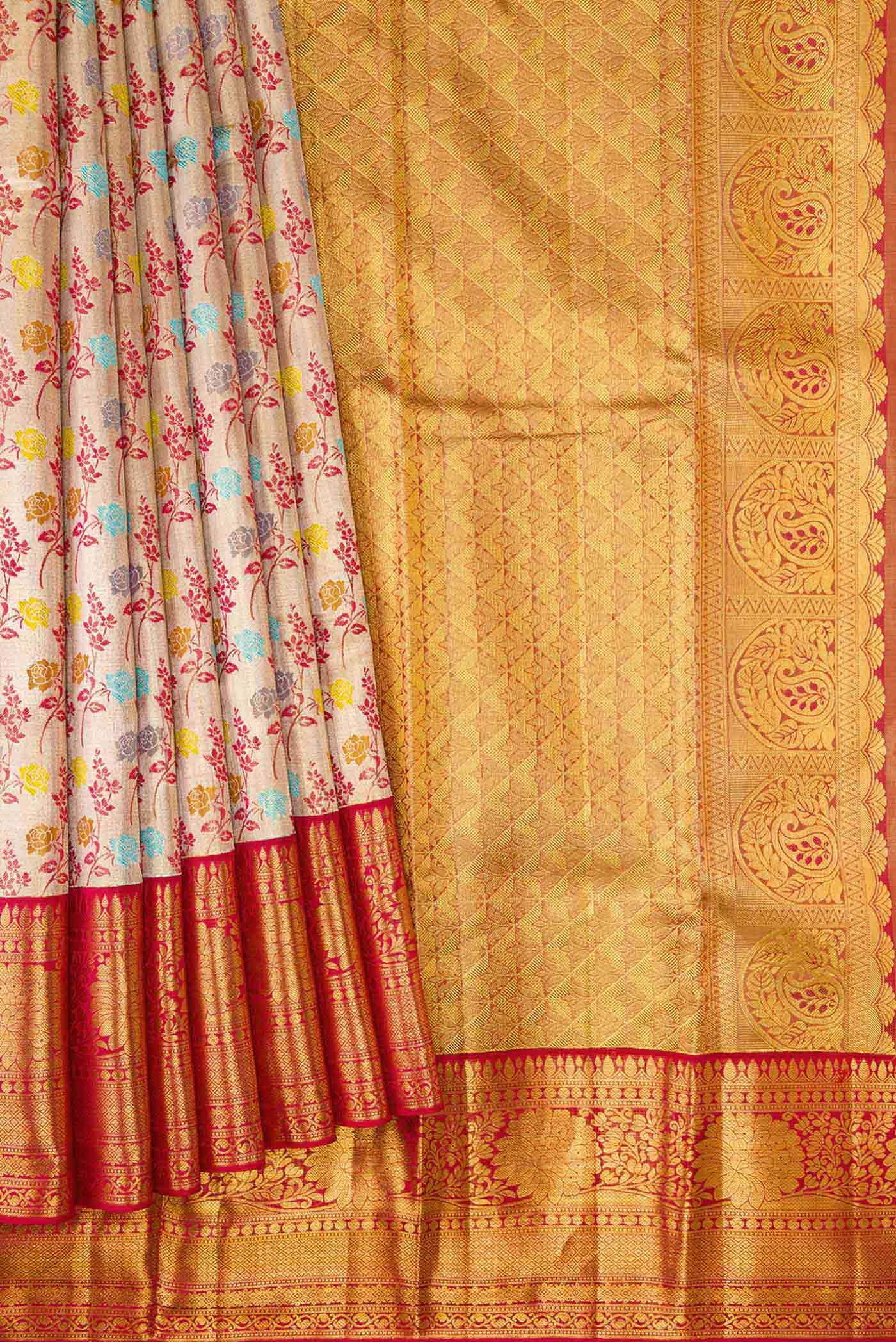 Pleats and pallu of Gold Dual Tone Kanchipuram Tissue Silk Saree with Zari Brocade on the body and Zari Border. 