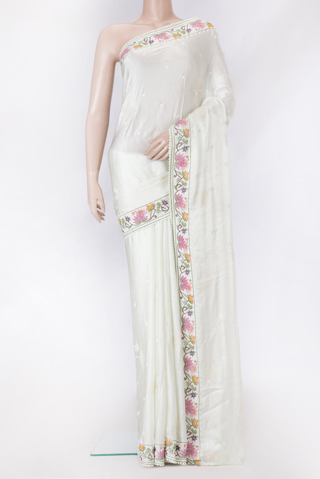 Pista Green Dual Tone Mysore Crepe Saree with Embroidery on the body and Embroidery Border.  displayed on a mannequin