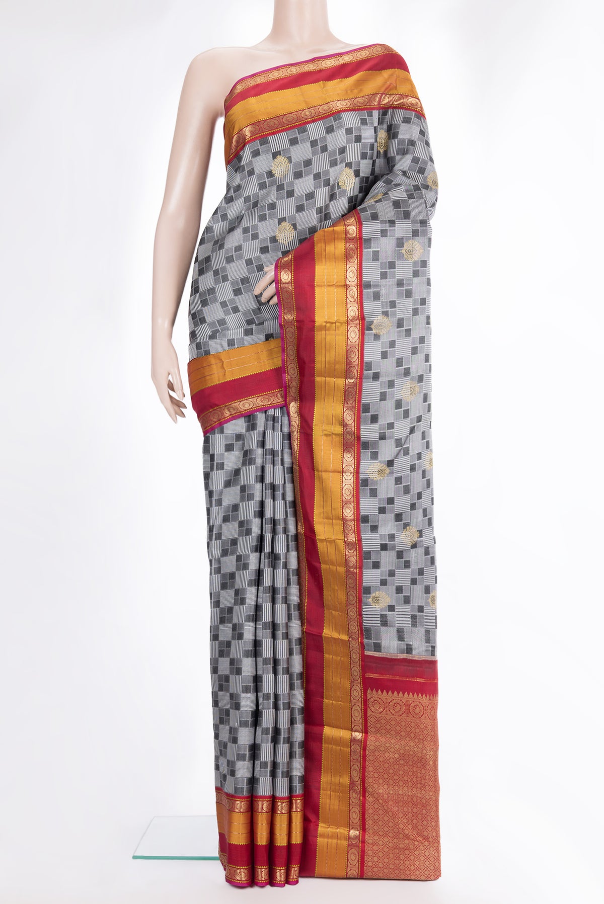 Pure Silk Grey Kanchipuram Saree with Jacquard With Zari Butta on the body and Zari Border.  displayed on a mannequin