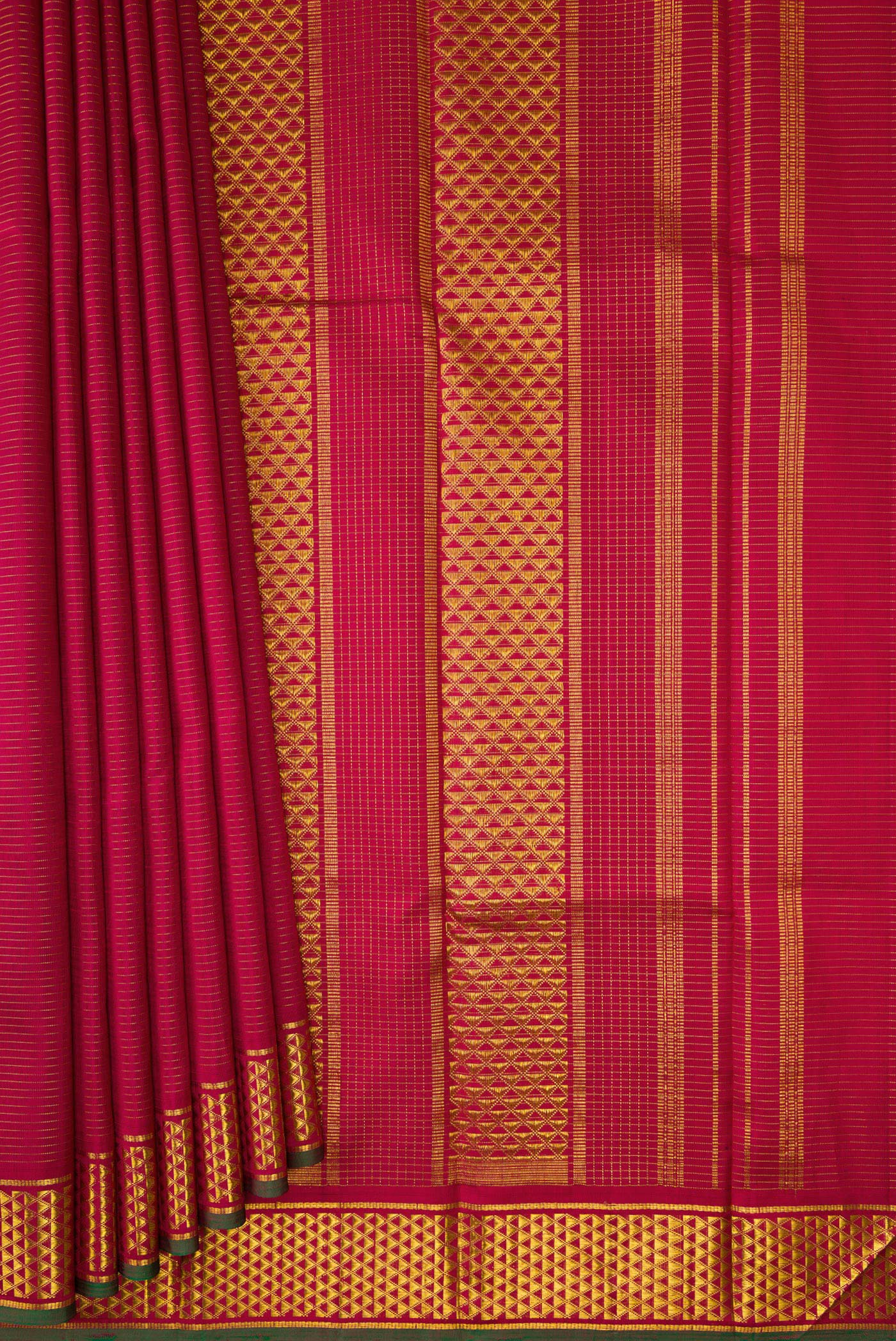 Pleats and pallu of Maroon Kanchipuram Silk Saree with Stripes on the body and Zari Border. 