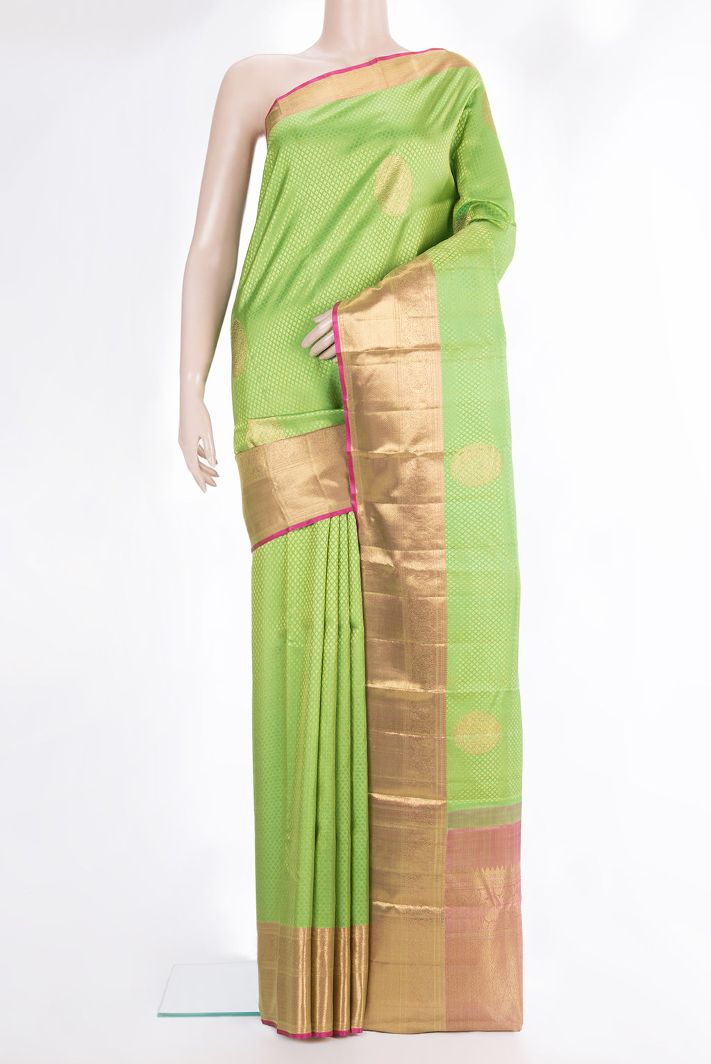 Pure Silk Parrot Green Kanchipuram Saree with Jacquard With Zari Butta on the body and Zari Border.  displayed on a mannequin