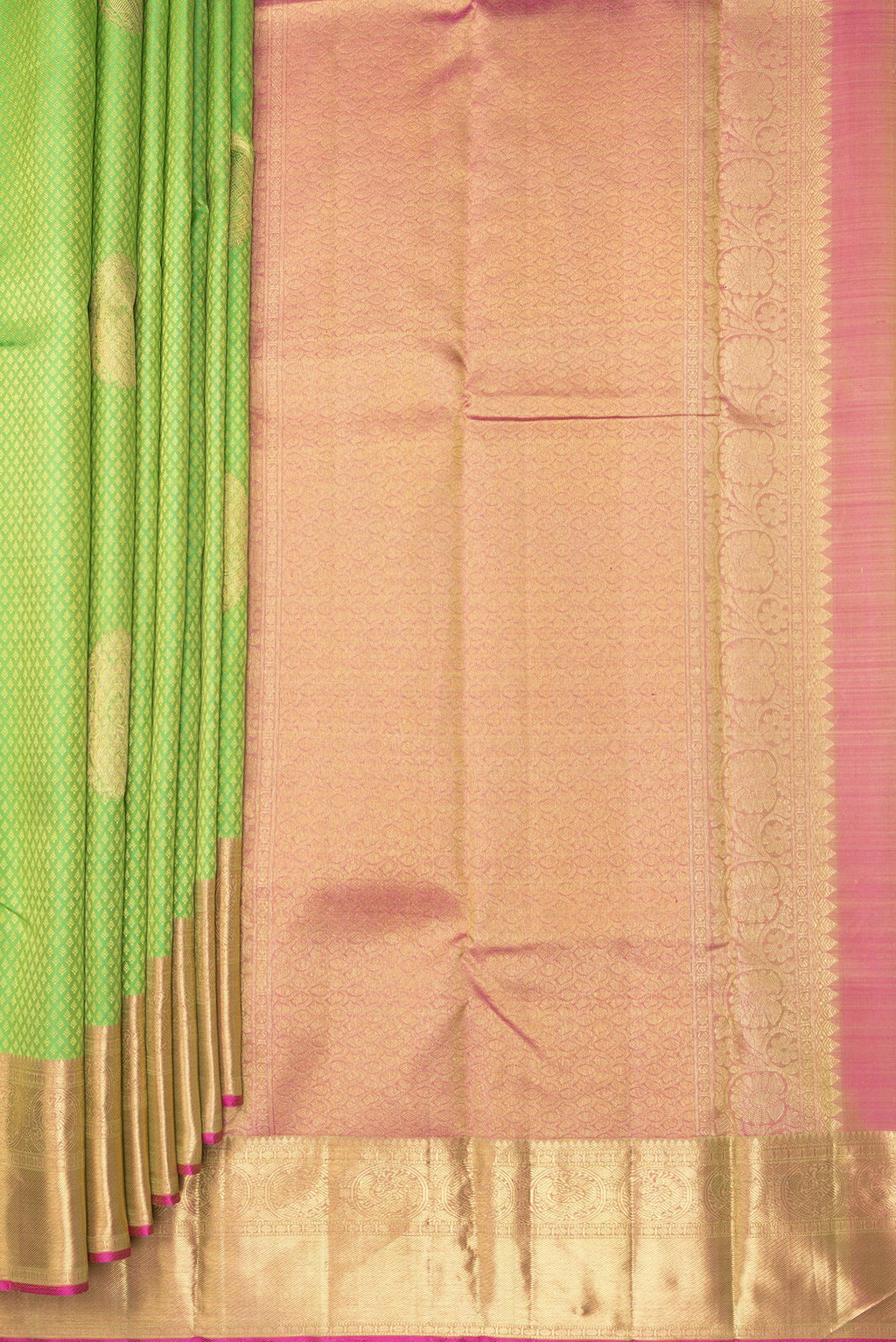 Pleats and pallu of Pure Silk Parrot Green Kanchipuram Saree with Jacquard With Zari Butta on the body and Zari Border. 