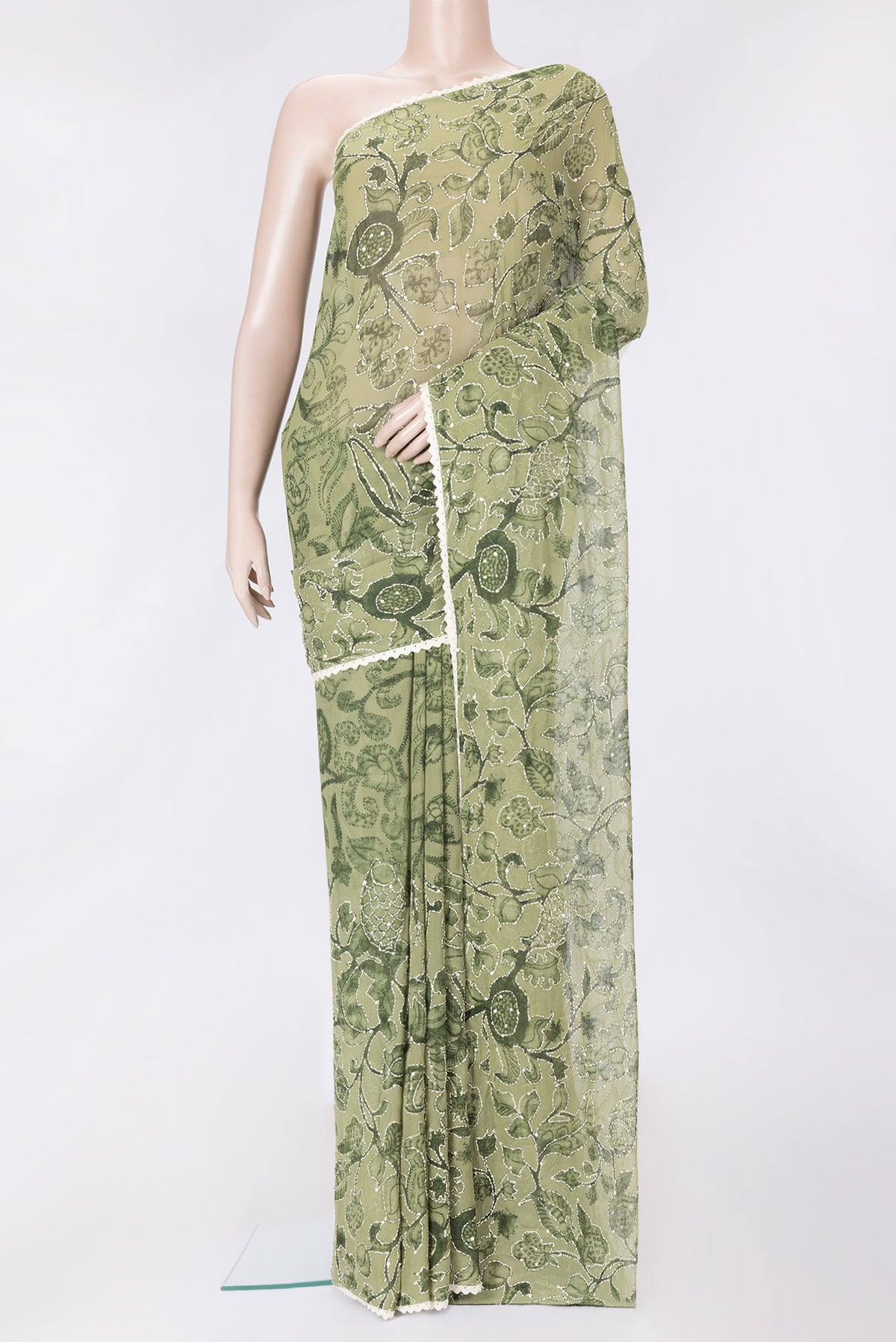 Green Dual Tone Mysore Georgette Saree with Embroidery on the body and Embroidery Border.  displayed on a mannequin