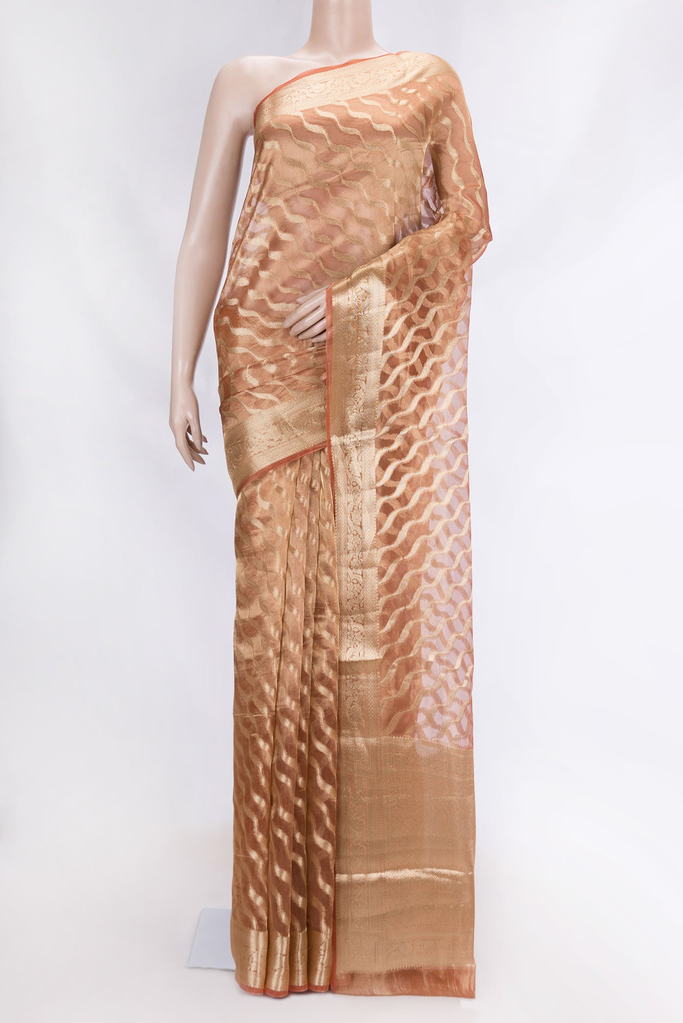 Orange Dual Tone Organza Silk Saree with Zari Brocade on the body and Zari Border displayed on a mannequin