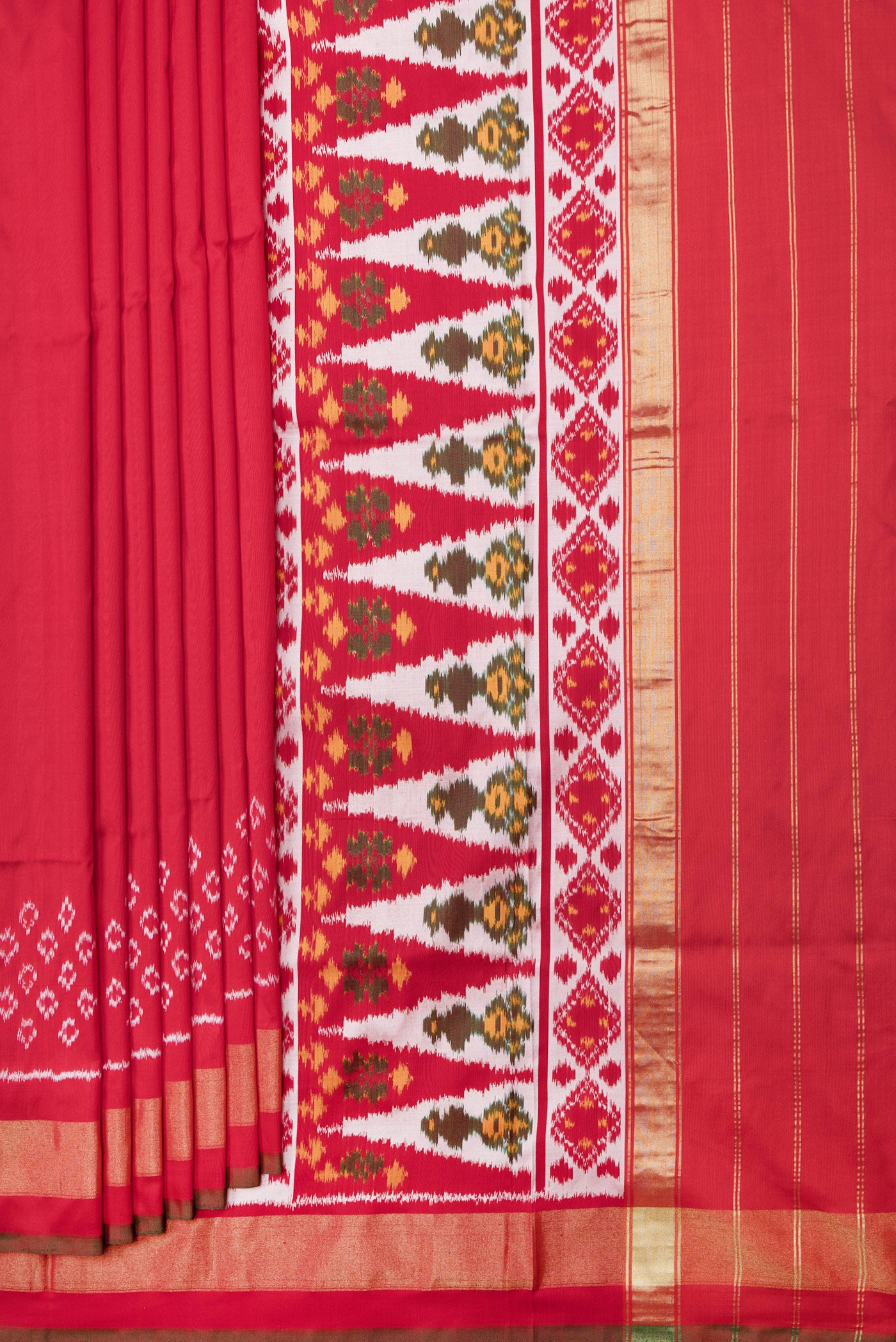 Pleats and pallu of Red Dual Tone Double Ikat Saree with Ikat Print on the body and Ikat Border. 