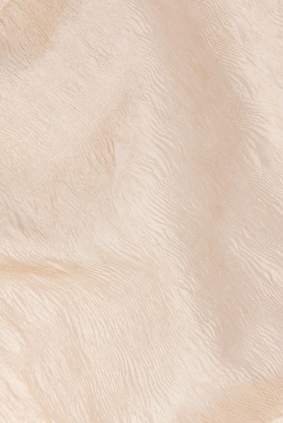 Close up of Gold Dual Tone Organza Silk Saree with Plain Body and Embroidery Border.  displaying folds