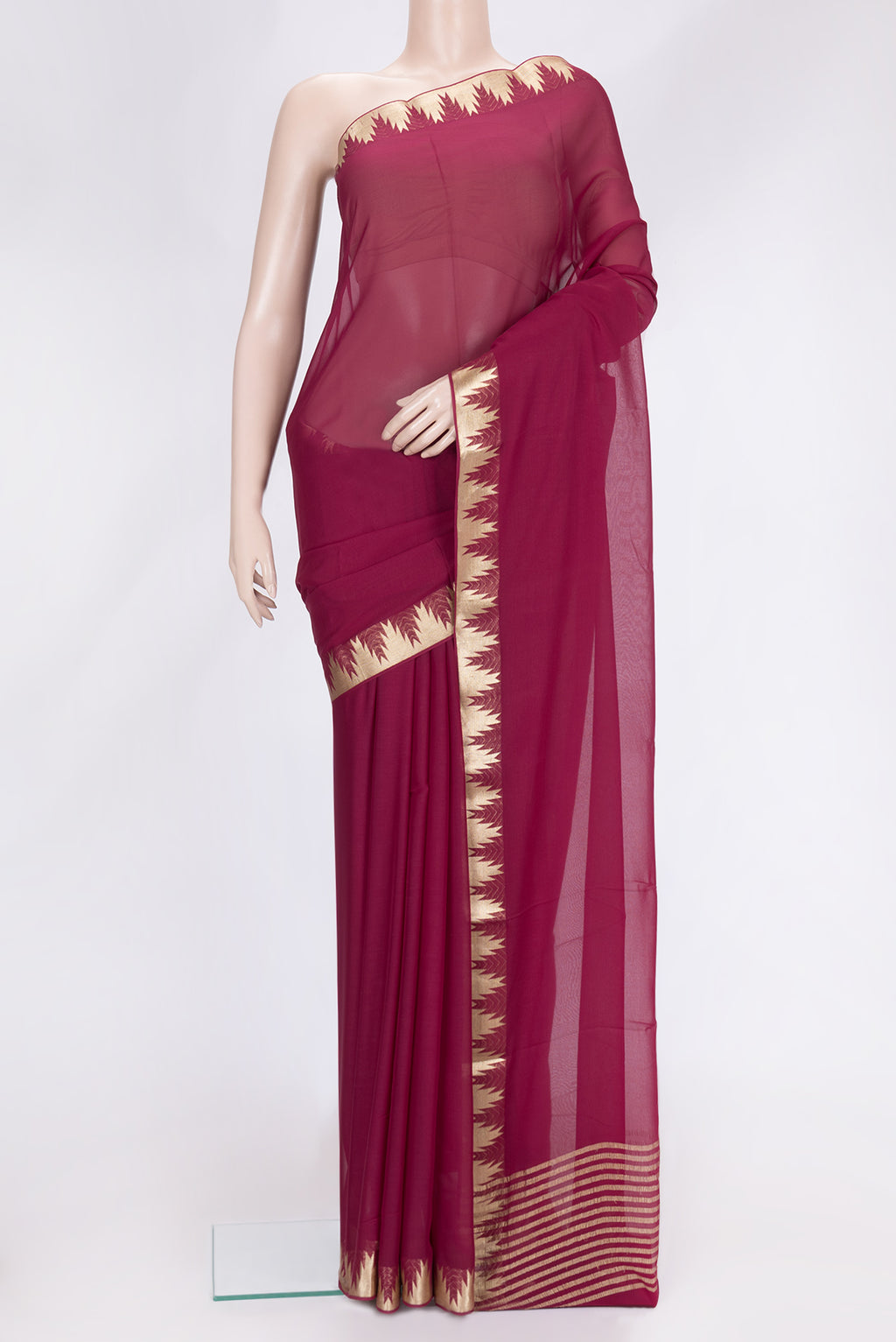Magenta Dual Tone Mysore Georgette Saree with Plain Body and Temple Border.  displayed on a mannequin