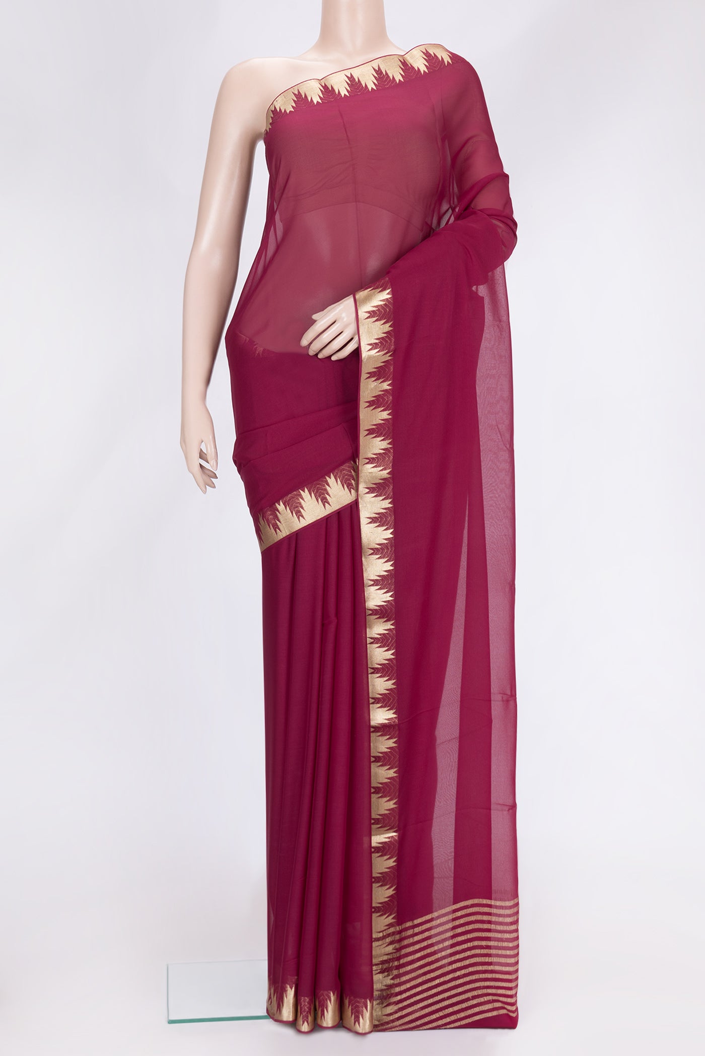 Magenta Dual Tone Mysore Georgette Saree with Plain Body and Temple Border.  displayed on a mannequin