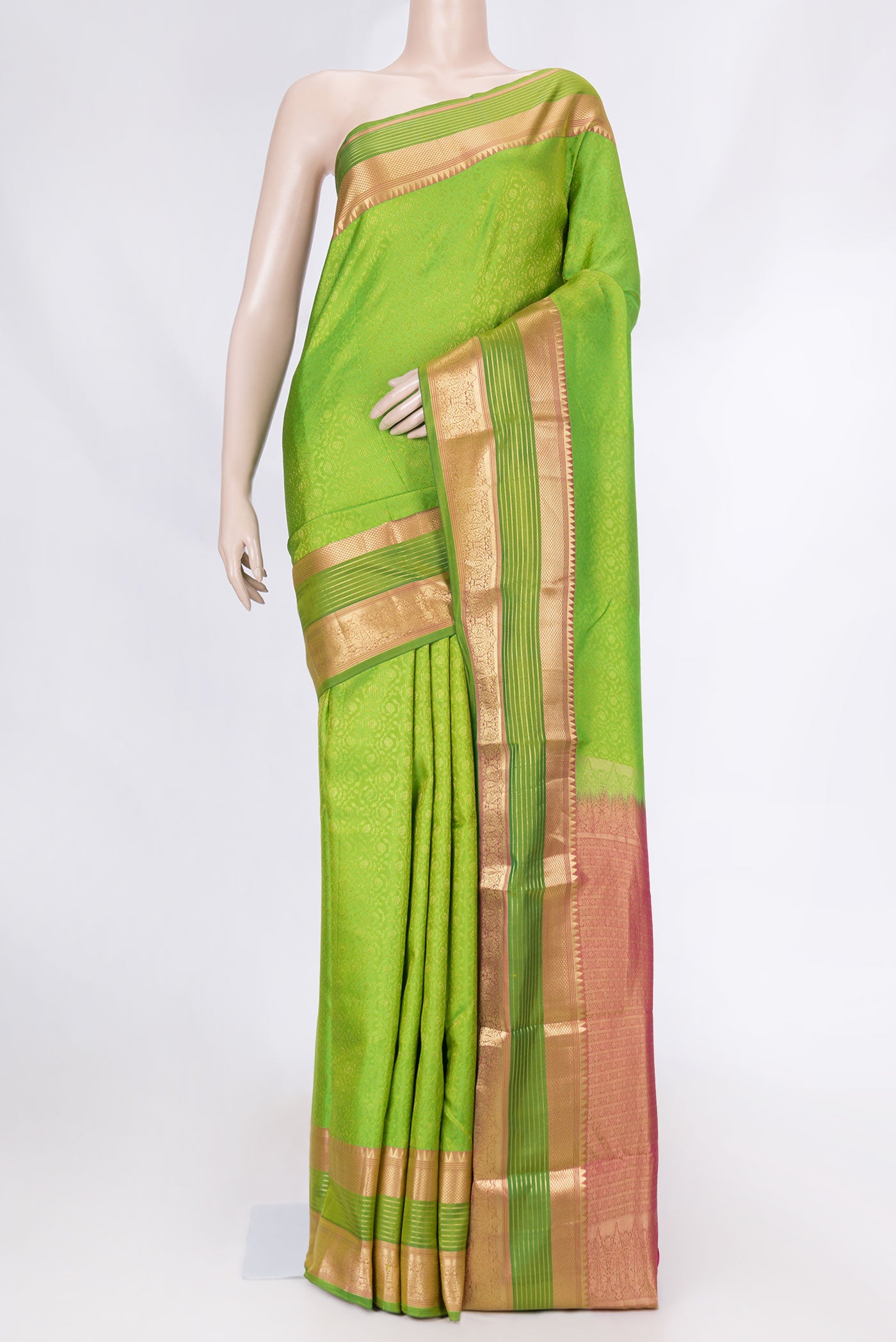 Parrot Green Dual Tone Kanchipuram Saree with Jacquard With Zari Butta on the body and Zari Border displayed on a mannequin