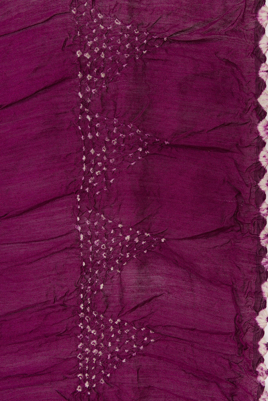 Border image of Magenta and Purple Color Bandhani Silk Saree with Bandhani Print on the body and Printed Border. 