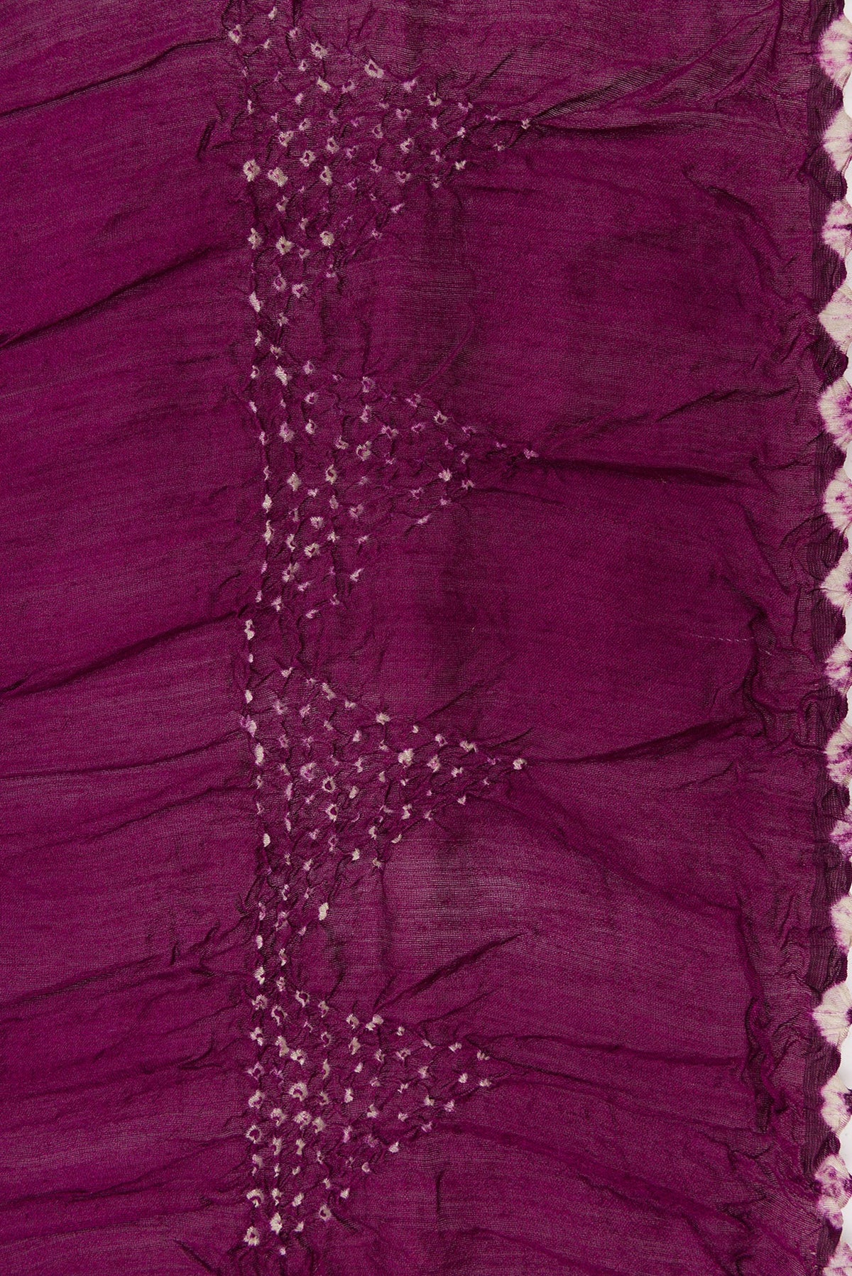 Border image of Magenta and Purple Color Bandhani Silk Saree with Bandhani Print on the body and Printed Border. 