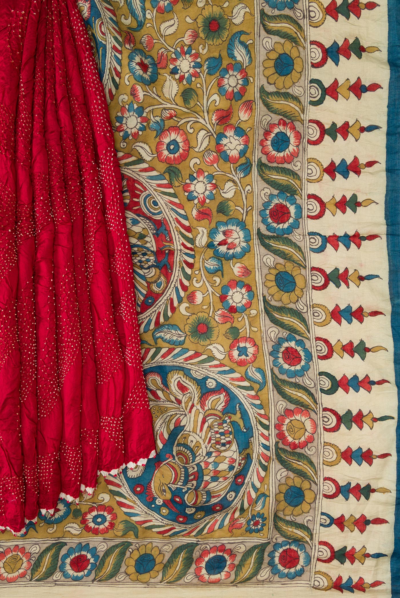 Pleats and pallu of Maroon Dual Tone Bandhani Silk Saree with Bandhani Print on the body and Printed Border. 