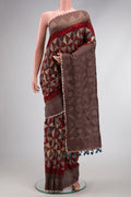 Maroon Dual Tone Bandhani Silk Saree with Bandhani Print on the body and Printed Border.  displayed on a mannequin