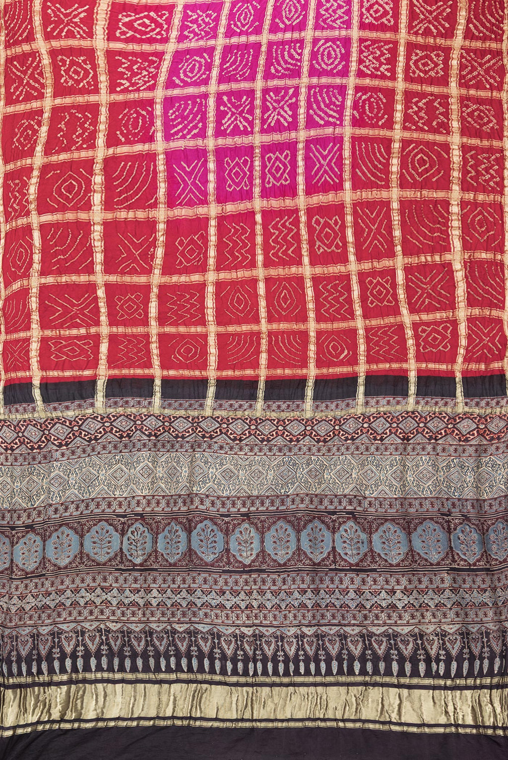 Flat view of Pure Silk Pink and Red Color Bandhani Saree with Bandhani on the body and Without Border. 