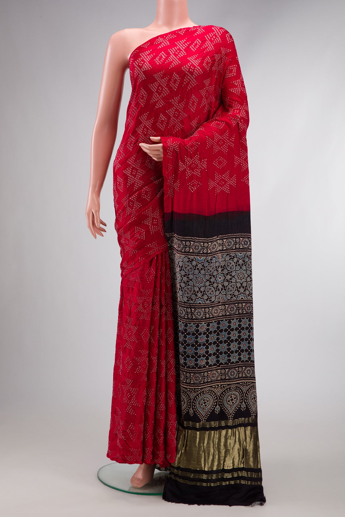 Red Dual Tone Bandhani Silk Saree with Bandhani Print on the body and Without Border.  displayed on a mannequin