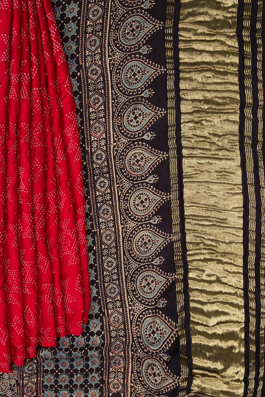 Pleats and pallu of Red Dual Tone Bandhani Silk Saree with Bandhani Print on the body and Without Border. 