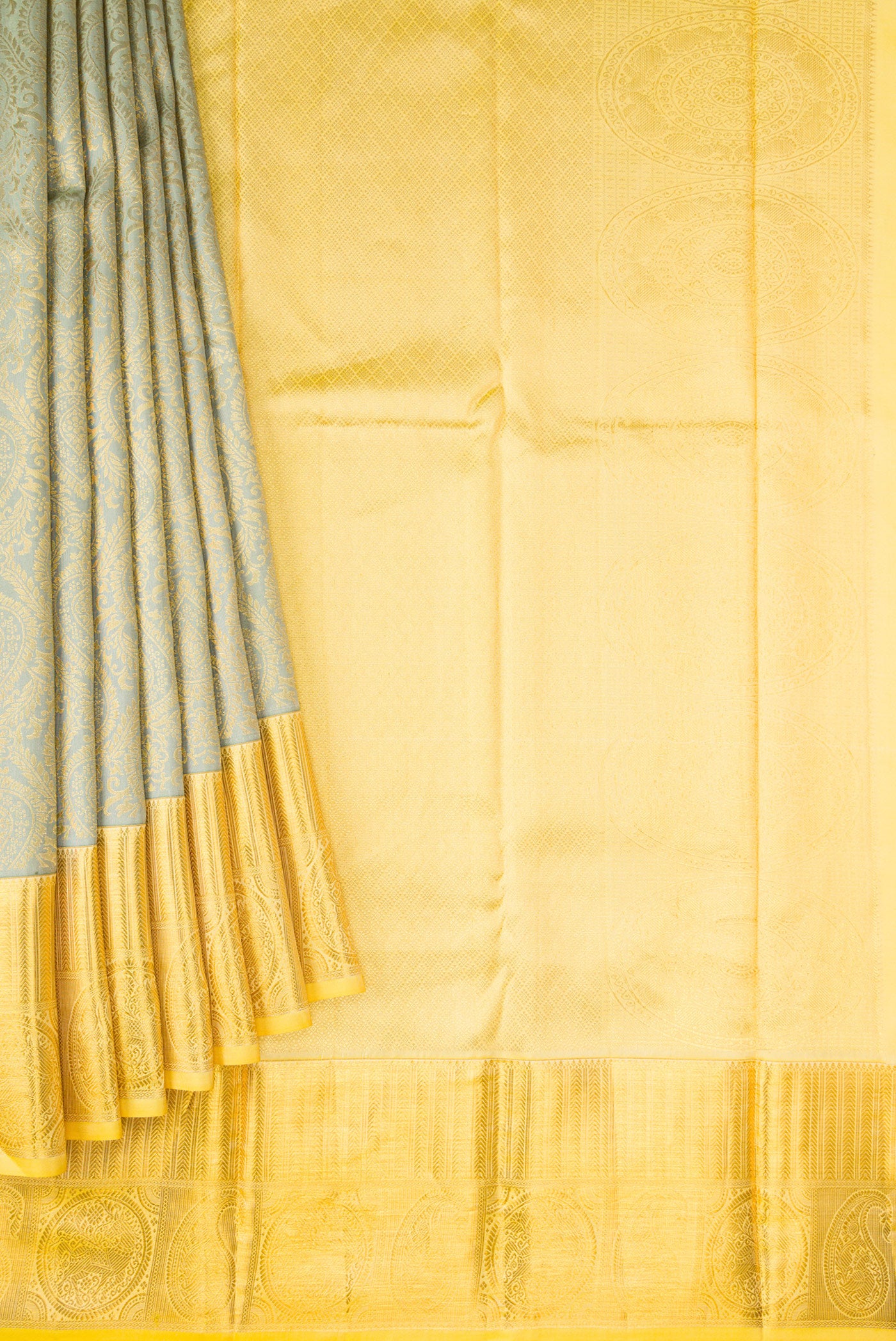 Pleats and pallu of Pista Green Dual Tone Kanjivaram Silk Saree with Zari Brocade on the body and Zari Border. 
