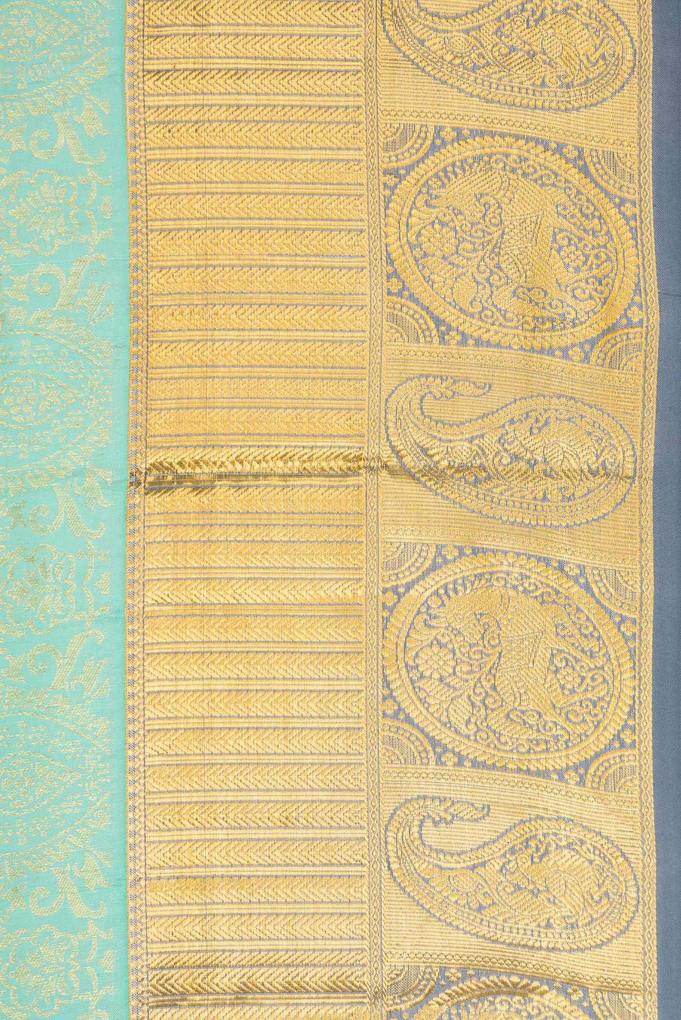 Border image of Sea Green Dual Tone Kanjivaram Silk Saree with Zari Brocade on the body and Zari Border. 