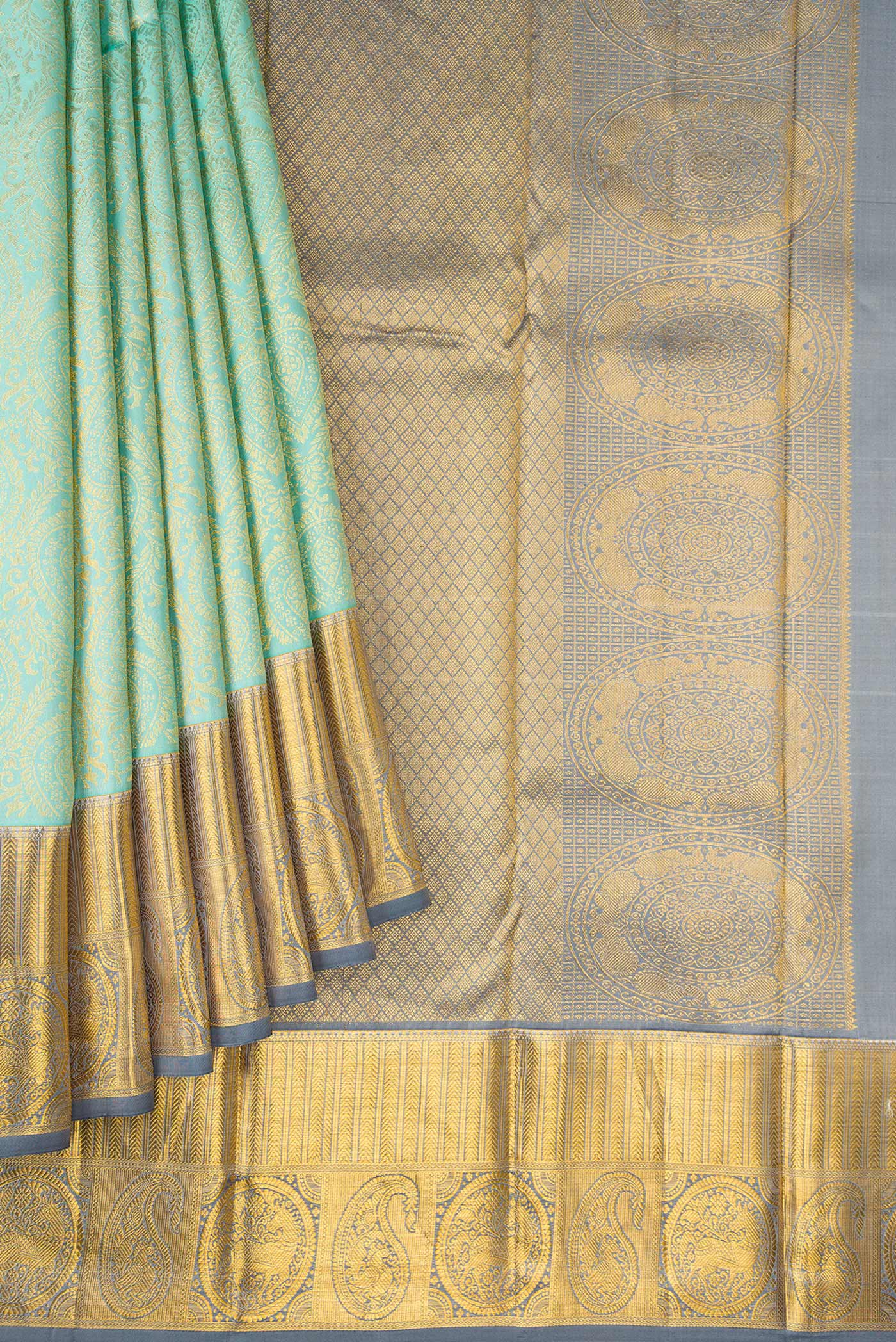 Pleats and pallu of Sea Green Dual Tone Kanjivaram Silk Saree with Zari Brocade on the body and Zari Border. 
