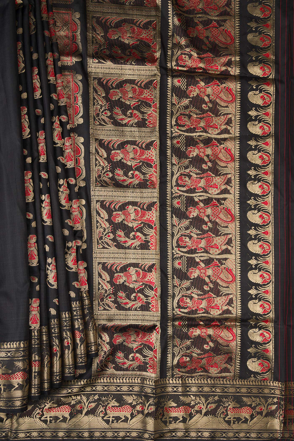 Pleats and pallu of Pure Silk Black Baluchari Saree with Zari And Thread Butta on the body and Fancy Border. 