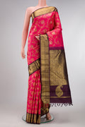 Pure Silk Pure Zari Pink Dual Tone Kanjivaram Saree with Zari Brocade on the body and Zari Border.  displayed on a mannequin