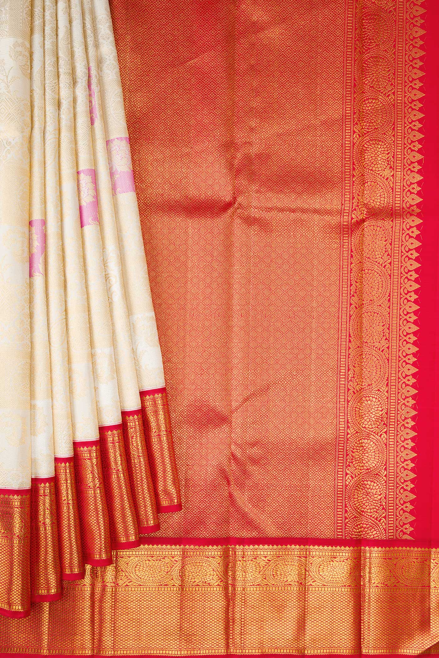 Pleats and pallu of Off White Dual Tone Kanchipuram Silk Saree with Zari Brocade on the body and Zari Border. 