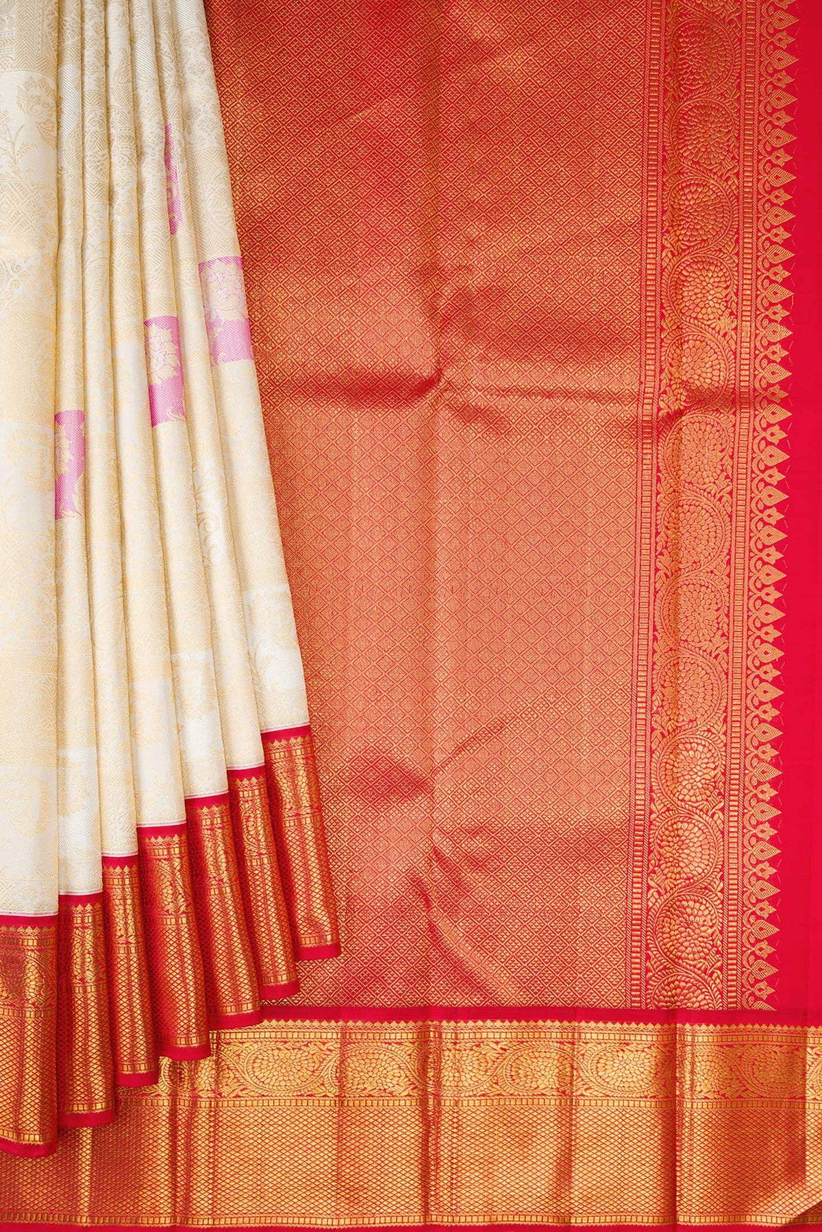 Pleats and pallu of Off White Dual Tone Kanchipuram Silk Saree with Zari Brocade on the body and Zari Border. 