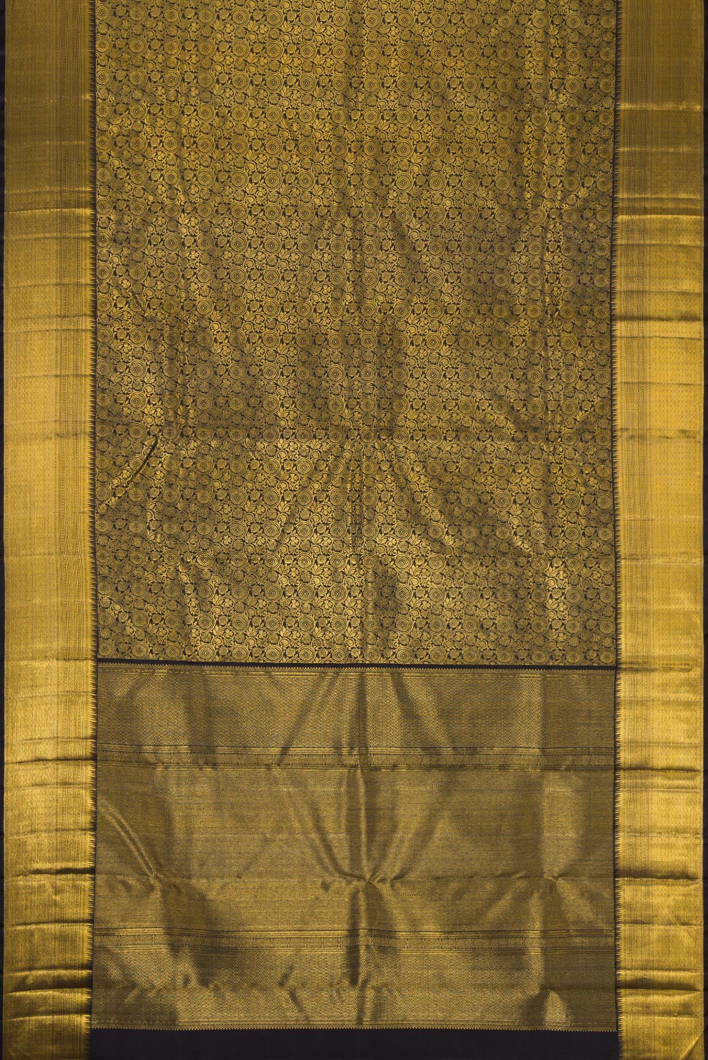 Flat view of Pure Silk Pure Zari Black Dual Tone Kanjivaram Saree with Zari Brocade on the body and Zari Border. 