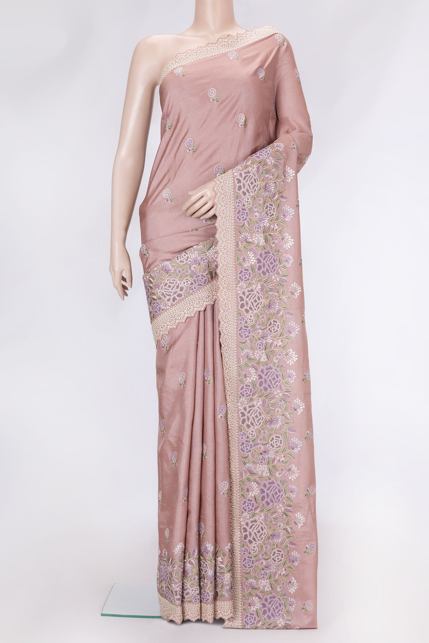 Rose Gold Dual Tone Tussar Silk Saree with Embroidery on the body and Embroidery Border.  displayed on a mannequin