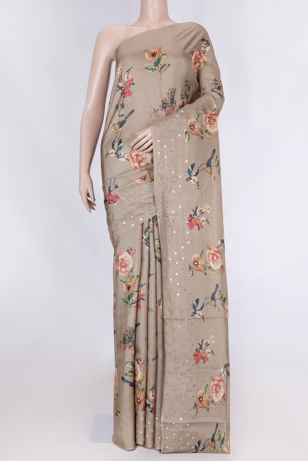 Brown Tussar Silk Saree with Floral Print on the body and Fancy Border displayed on a mannequin