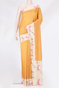 Mustard Kanjivaram Silk Saree with Stripes on the body and Fancy Border.  displayed on a mannequin