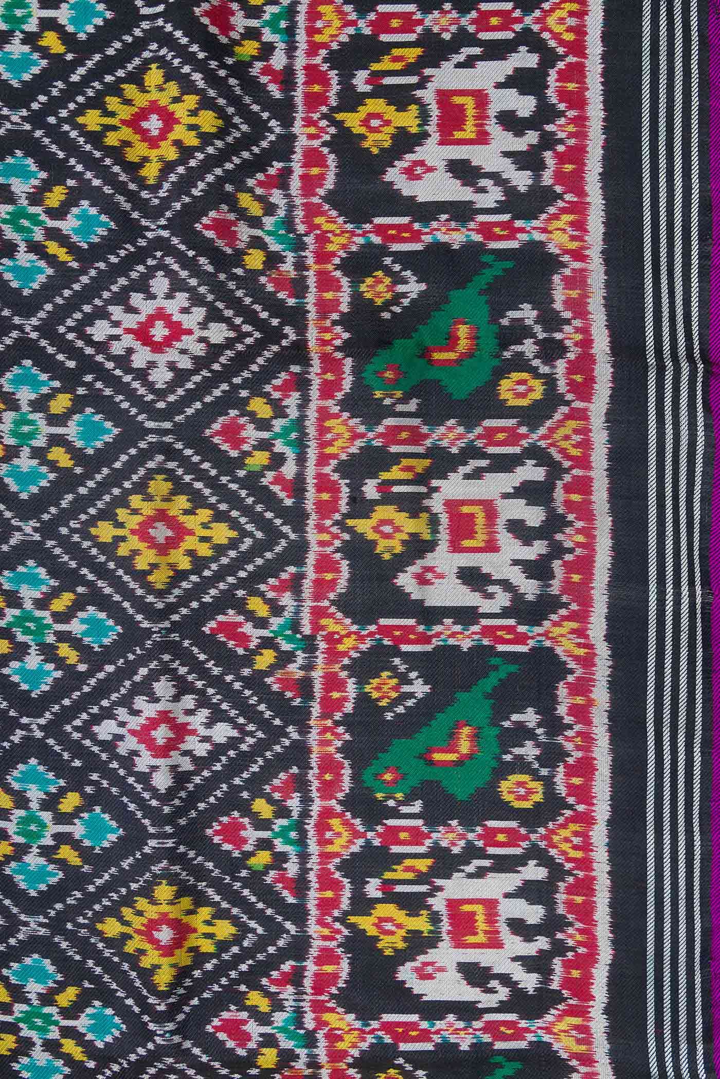 Border image of Black Pochampally Silk Saree with Pure Ikat on the body and Plain Border