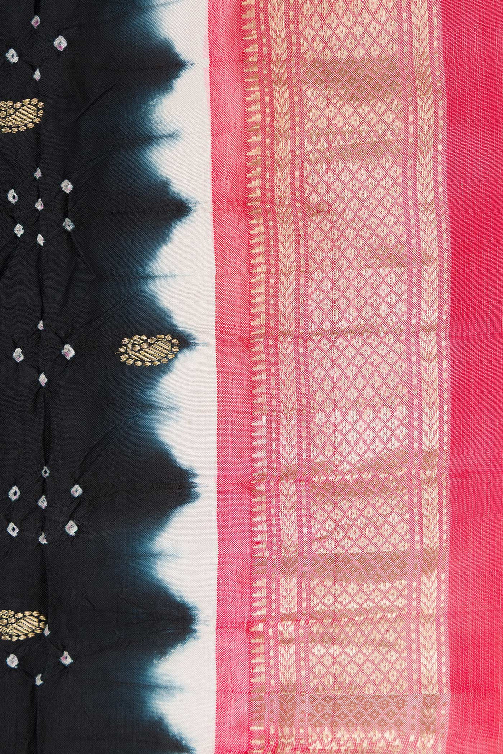 Border image of Black Dual Tone Bandhani Silk Saree with Bandhani Print on the body and Zari Border. 