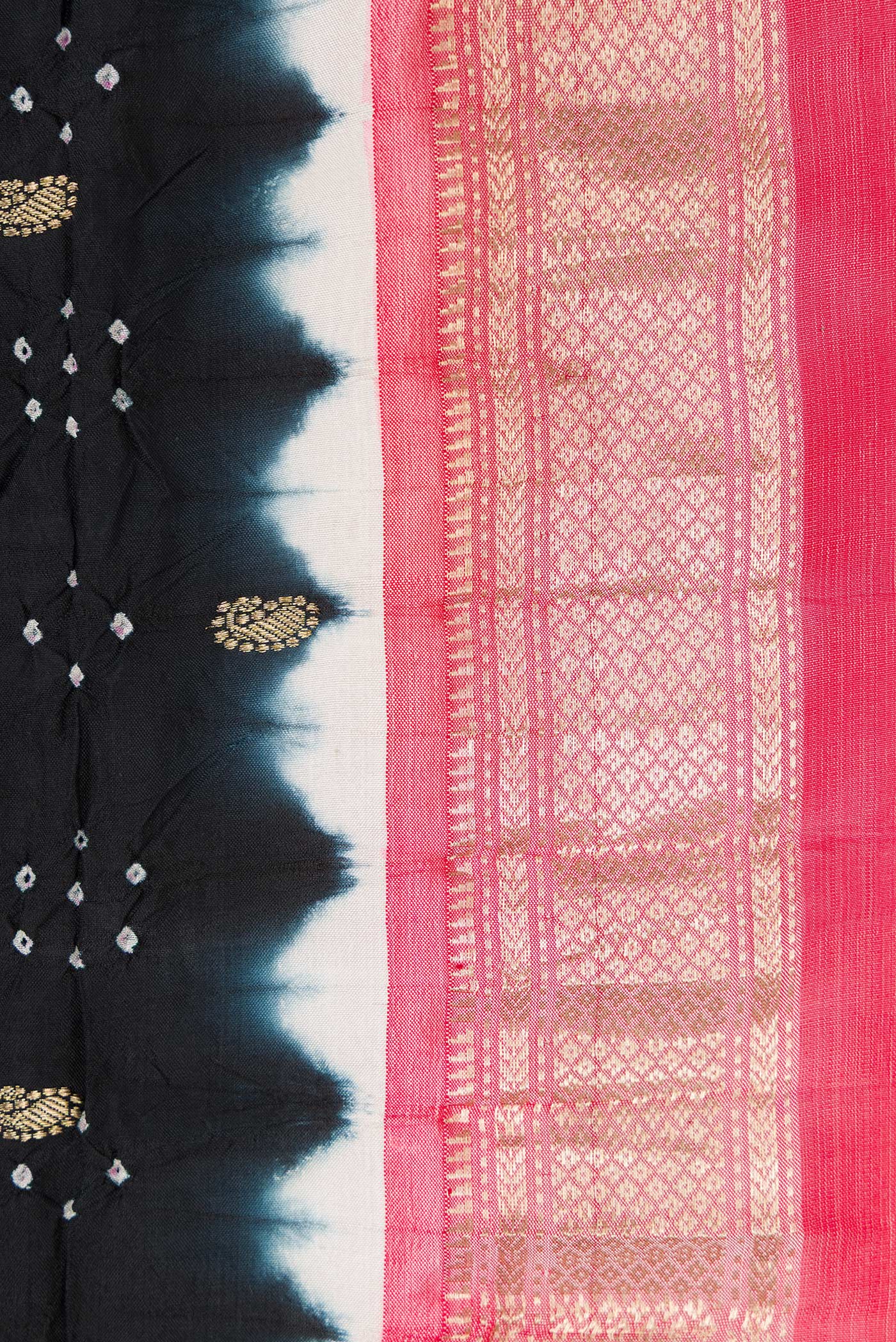 Border image of Black Dual Tone Bandhani Silk Saree with Bandhani Print on the body and Zari Border. 