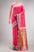 Pink Dual Tone Bandhani Silk Saree with Bandhani Print on the body and Zari Border.  displayed on a mannequin