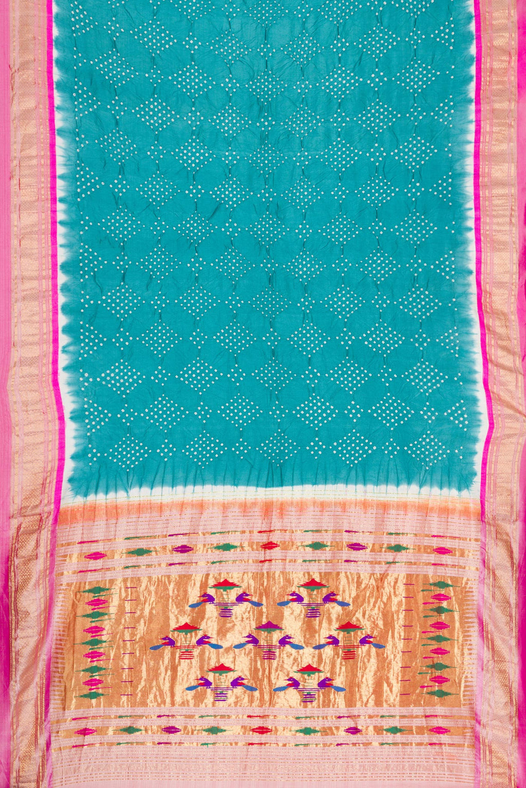 Flat view of Peacock Blue Dual Tone Bandhani Silk Saree with Bandhani Print on the body and Zari Border. 