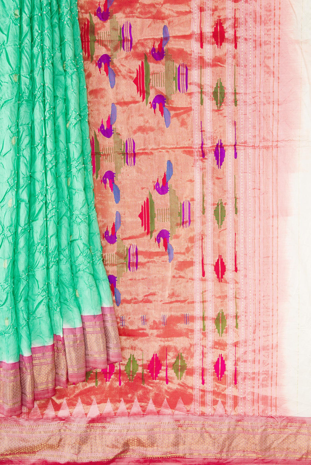 Pleats and pallu of Sea Green Dual Tone Bandhani Silk Saree with Bandhani Print on the body and Zari Border. 