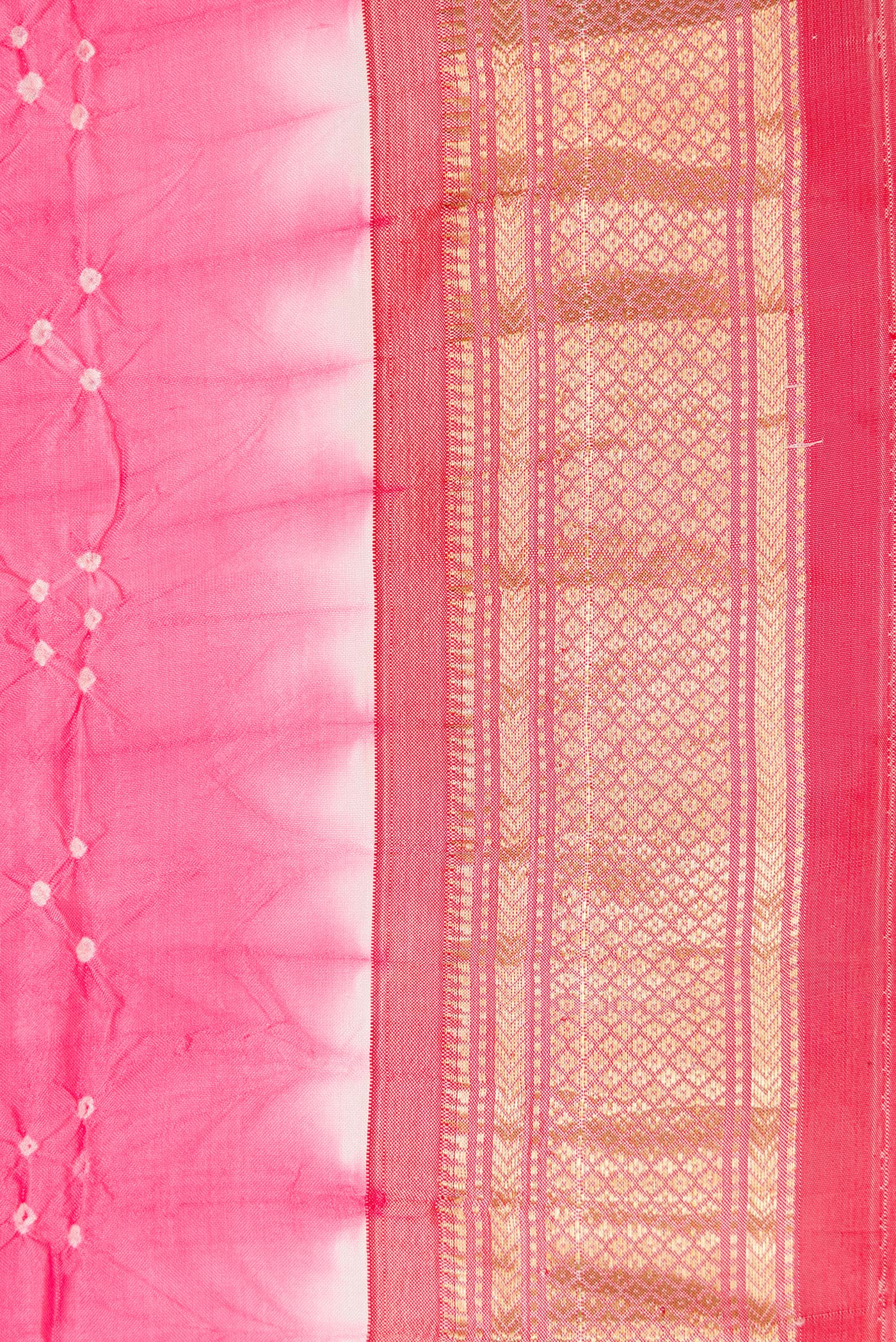 Border image of Pink Dual Tone Bandhani Silk Saree with Bandhani Print on the body and Zari Border. 
