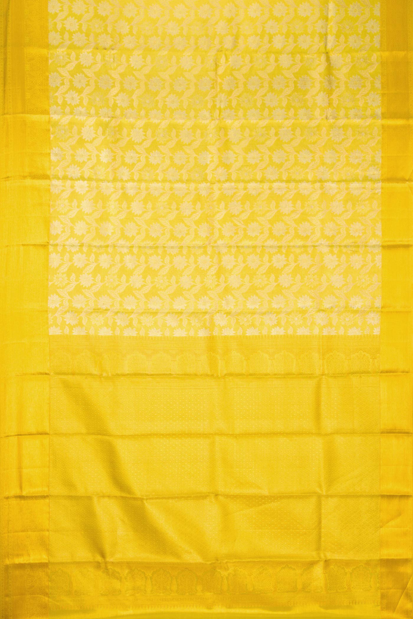 Flat view of Lemon Yellow Dual Tone Kanchipuram Tissue Silk Saree with Zari Brocade on the body and Zari Border. 