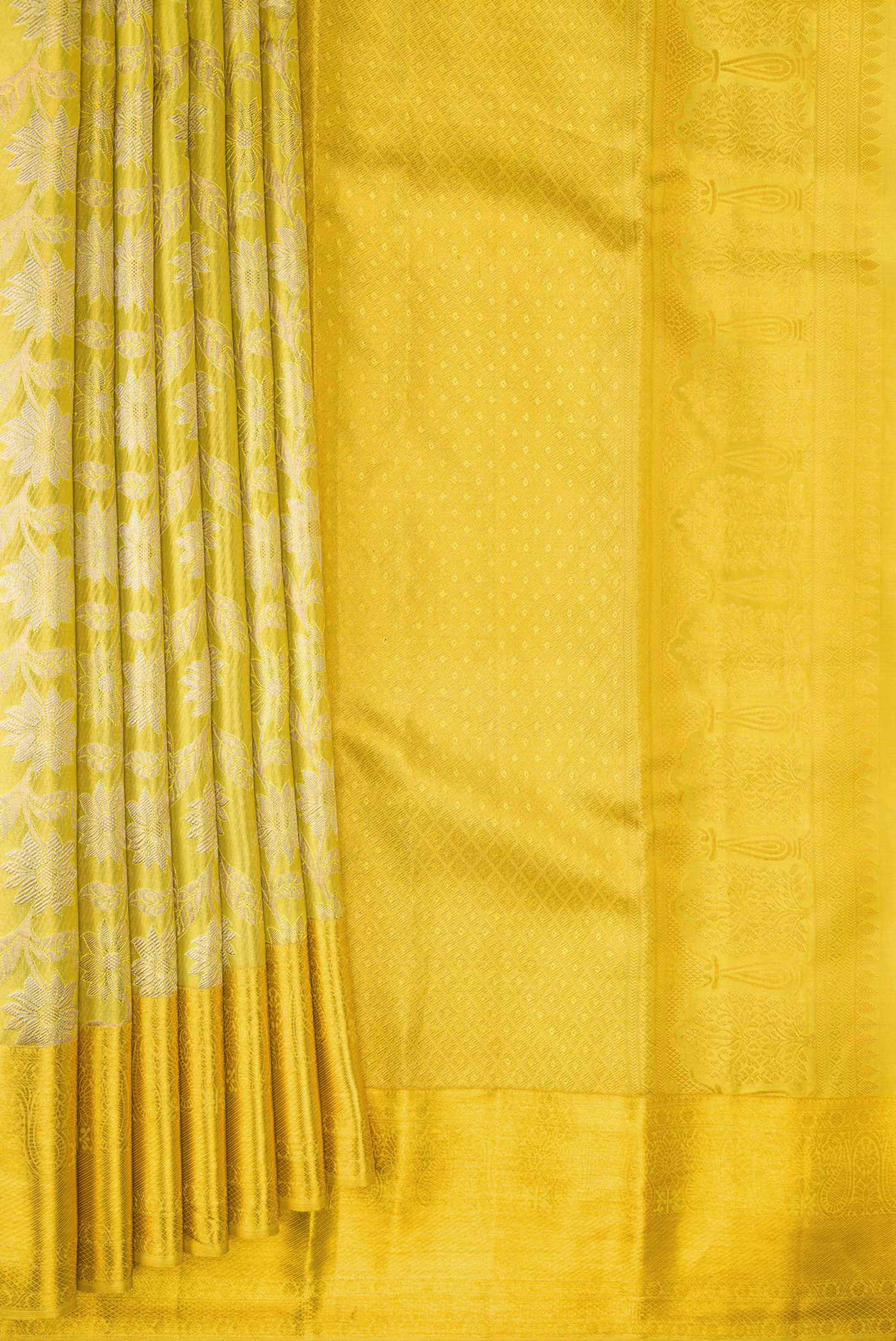 Pleats and pallu of Lemon Yellow Dual Tone Kanchipuram Tissue Silk Saree with Zari Brocade on the body and Zari Border. 