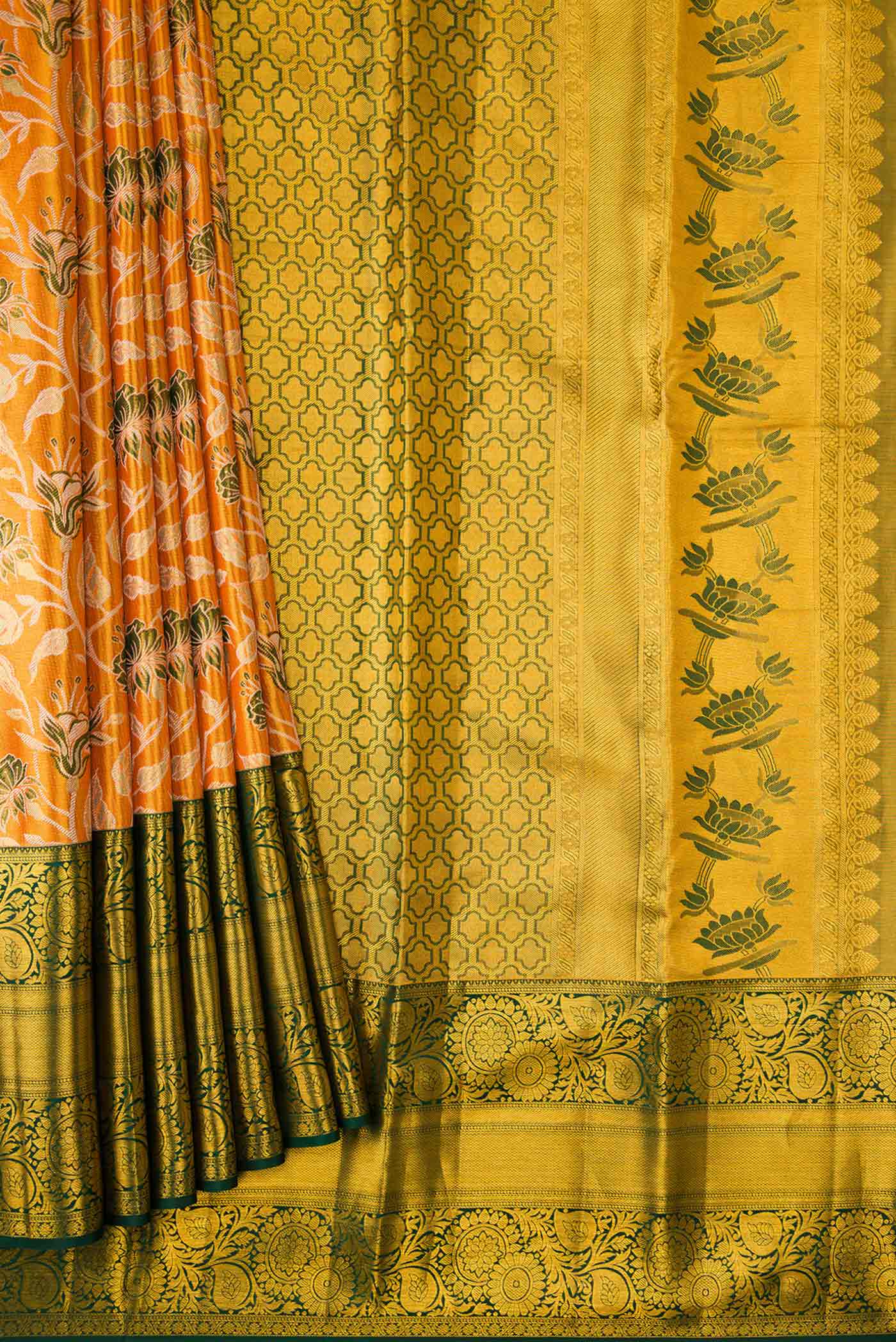 Pleats and pallu of Orange Dual Tone Kanchipuram Tissue Silk Saree with Zari Brocade on the body and Zari Border. 