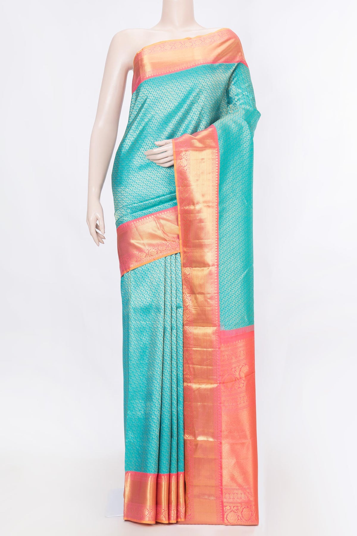 Pure Silk Pure Zari Green Dual Tone Kanchipuram Saree with Zari Brocade on the body and Zari Border displayed on a mannequin