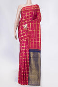 Pink Dual Tone Kanchipuram Saree with Checked design on the body and Without Border displayed on a mannequin