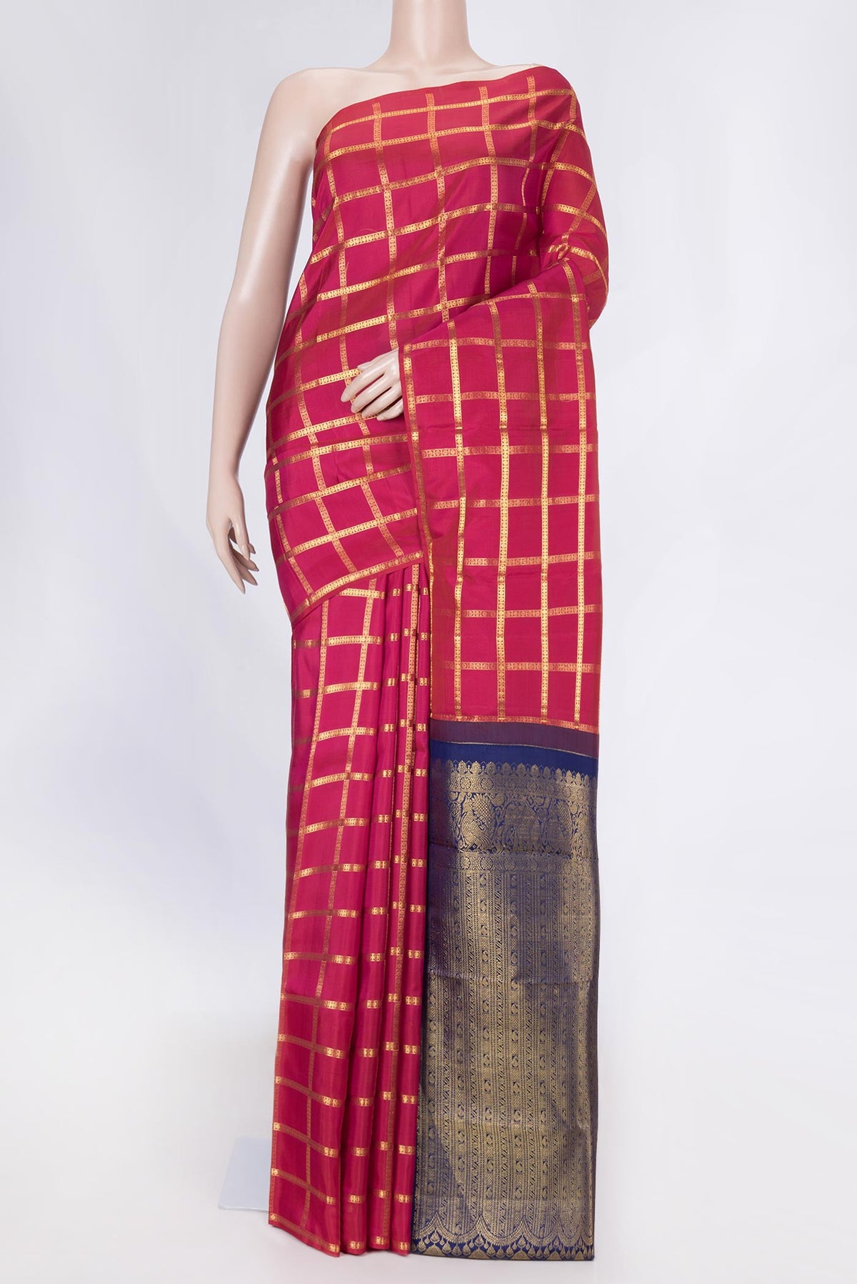 Pink Dual Tone Kanchipuram Saree with Checked design on the body and Without Border displayed on a mannequin