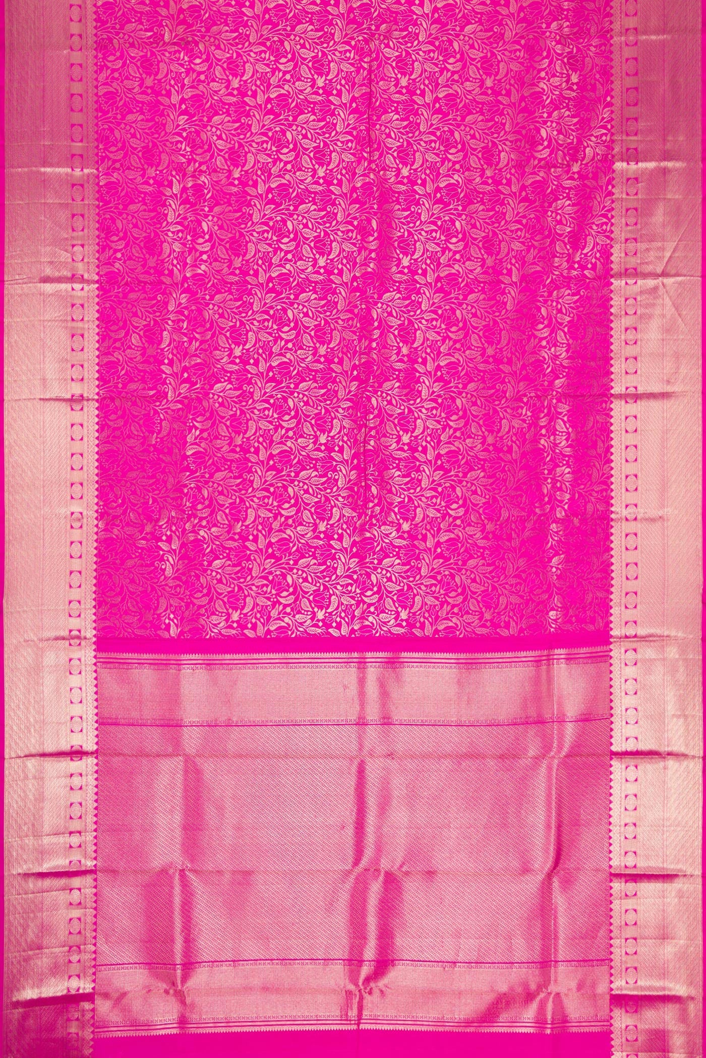 Flat view of Pink Dual Tone Kanchipuram Silk Saree with Zari Brocade on the body and Zari Border. 
