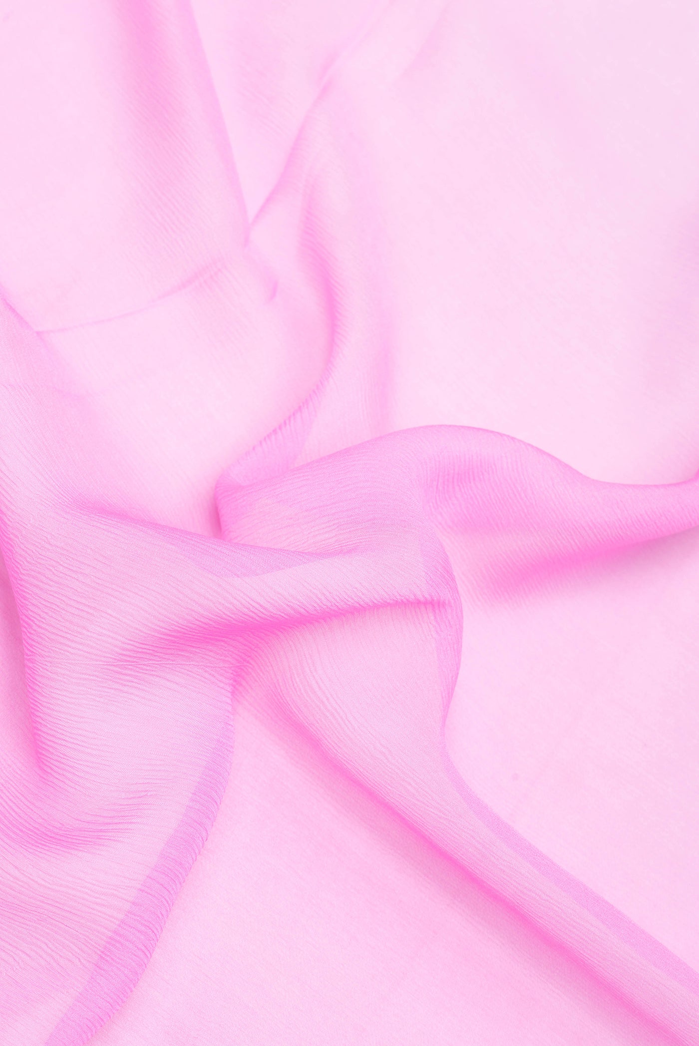 Close up of Pink Mysore Chiffon Saree with Plain Body and Plain Border.  displaying folds